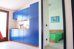 Appartamento, 1 camera da letto | Angolo cottura privato | Frigorifero, piano cottura, pentole/stoviglie/utensili