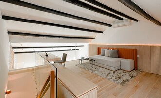 Deluxe Triple Room | Living area | Smart TV, iPad