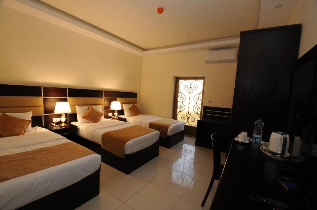 triple room | 1 bedroom, premium bedding, in-room safe, desk