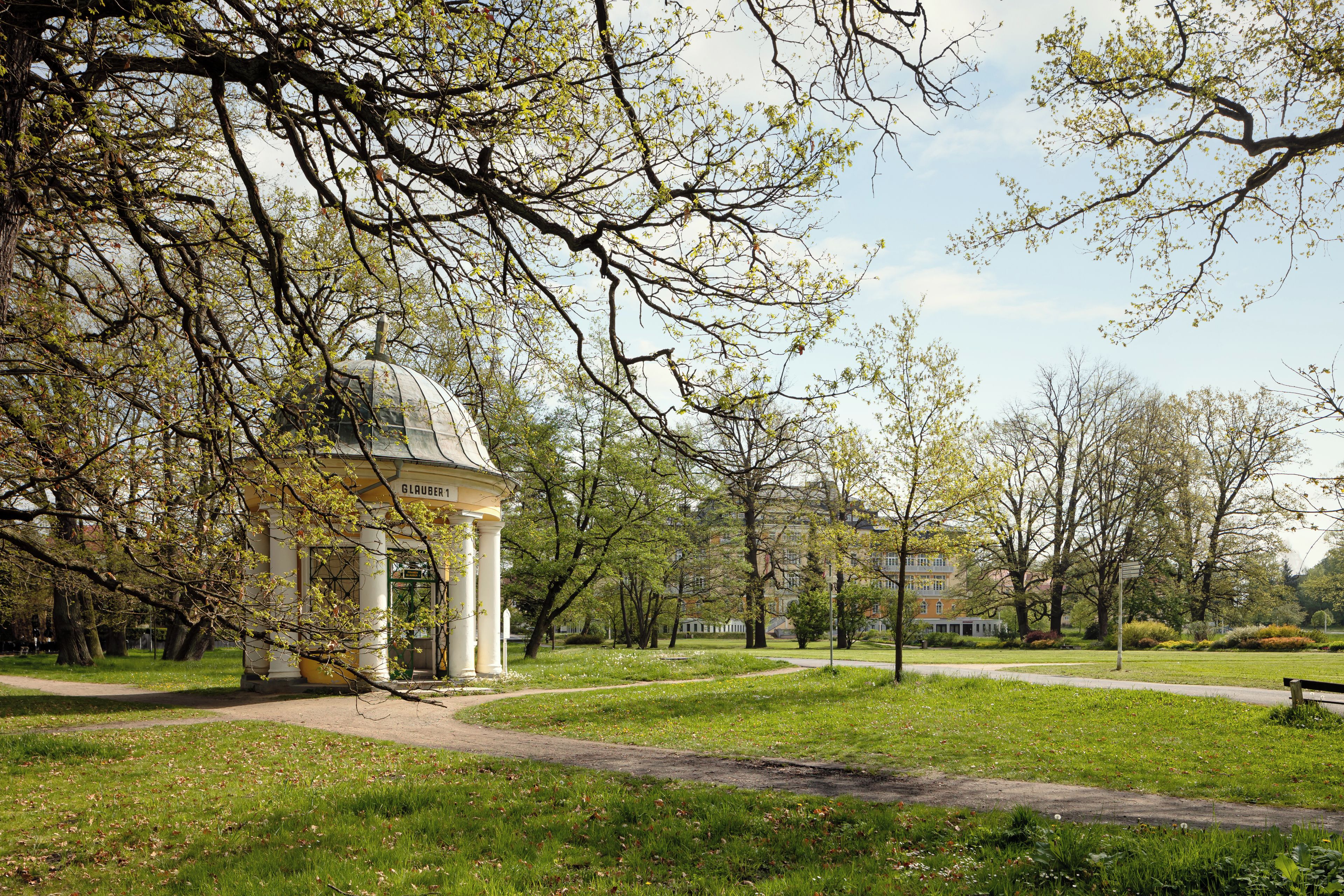 A park with a gazebo, pathways, and trees.