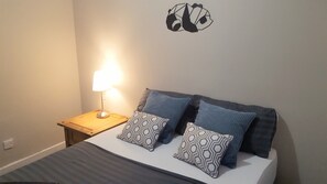 2 bedrooms, blackout drapes, iron/ironing board, free cribs/infant beds