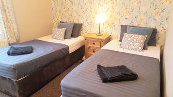 2 bedrooms, blackout drapes, iron/ironing board, free cribs/infant beds