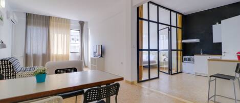 Apartment, Multiple Beds | Living area | Smart TV