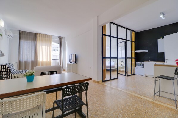 Apartment, Multiple Beds | Living area | Smart TV