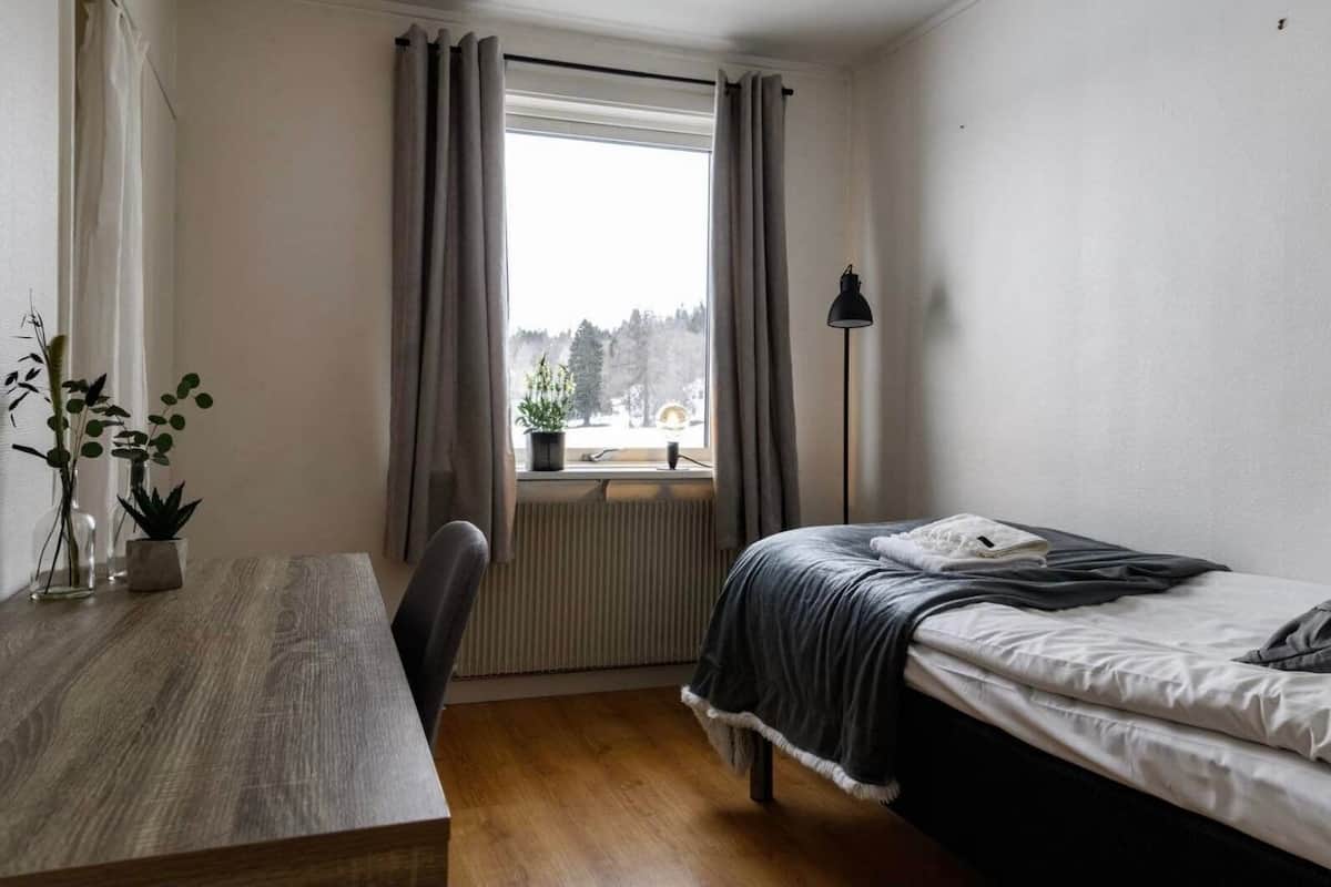Basic Single Room | Premium bedding, down comforters, pillowtop beds, blackout drapes