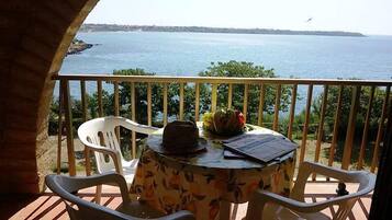 Apartamento, 1 quarto, terraço, vista para o mar | Sacada