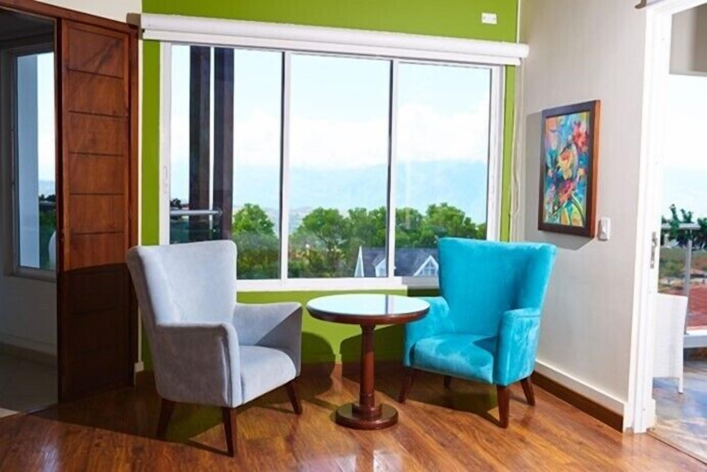 presidential suite, 1 bedroom, non smoking, mountain view | living room | 49-inch flat-screen tv with cable channels, tv, first-run films
