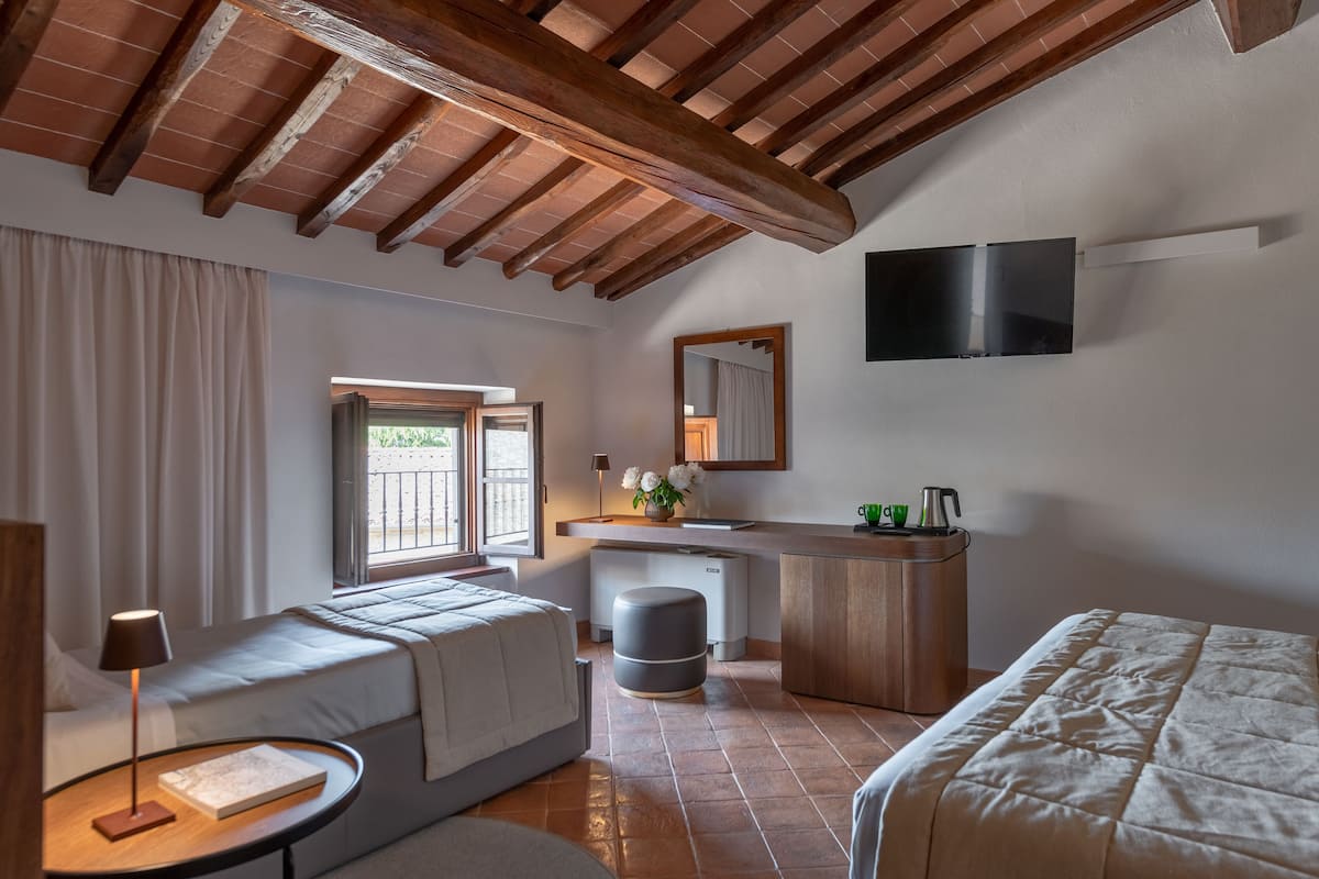 comfort triple room | down duvets, in-room safe, desk, laptop workspace