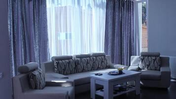 61-inch LCD TV with satellite channels, TV