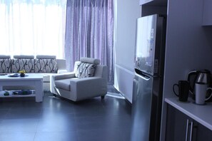 61-inch LCD TV with satellite channels, TV