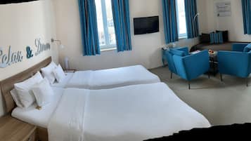 Triple Room | Egyptian cotton sheets, hypo-allergenic bedding, in-room safe