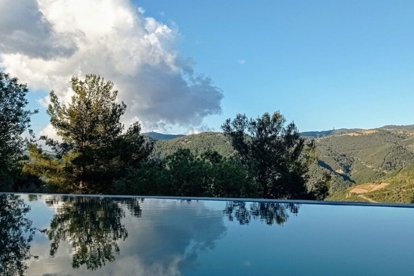 Seasonal outdoor pool, open 9:00 AM to 11:30 PM, pool umbrellas