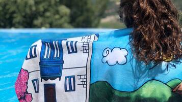 Seasonal outdoor pool, open 9:00 AM to 11:30 PM, pool umbrellas