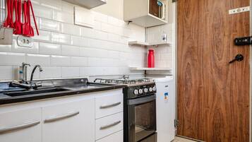 Apartment | Private kitchen | Fridge, microwave, oven, stovetop