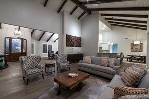 Smart TV, fireplace, foosball, books