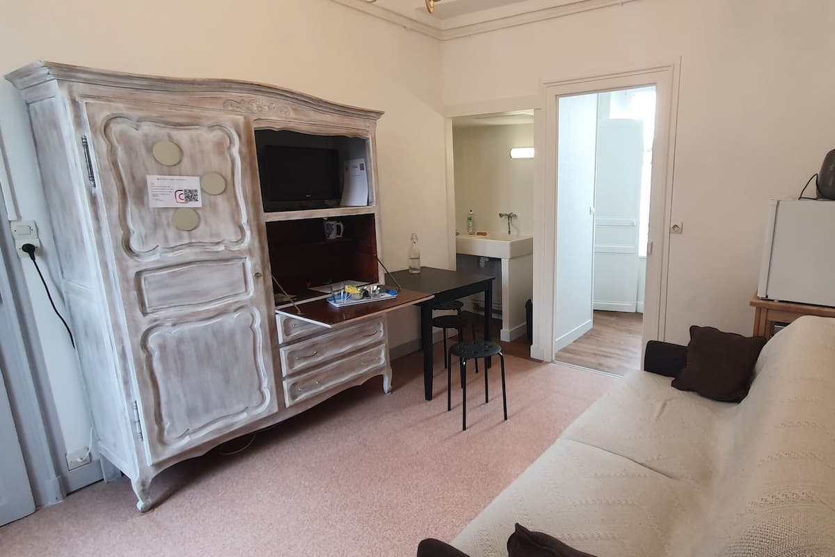 Habitación familiar (Marille) | Área de sala de estar | Televisión de pantalla plana