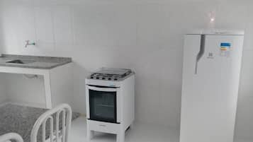 Fridge, microwave, stovetop, cookware/dishes/utensils