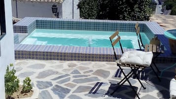 Outdoor pool, open 8:00 AM to midnight, sun loungers