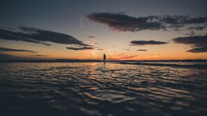 On the beach, surfing, kayaking