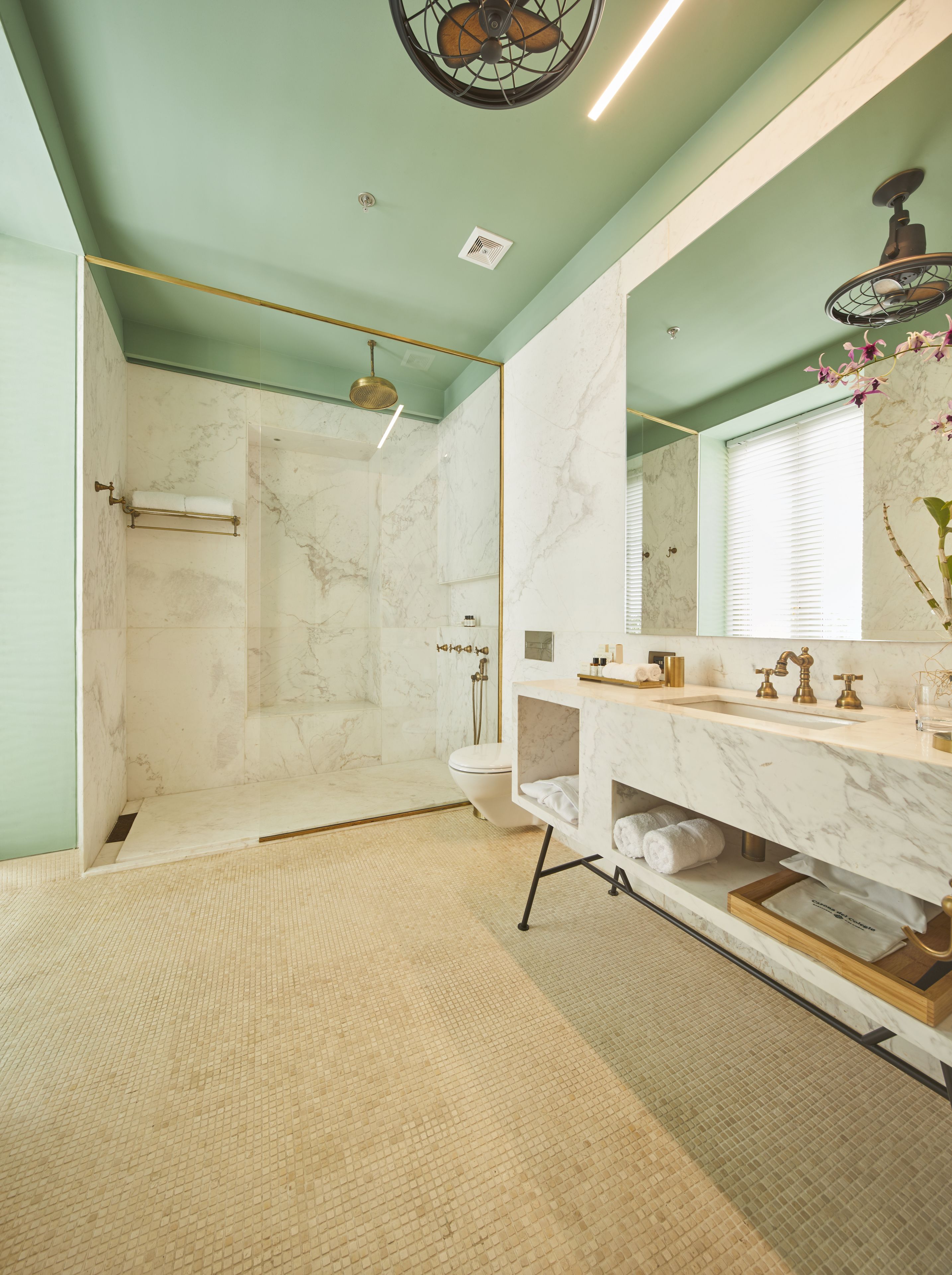 junior suite, 1 king bed, non smoking | bathroom | shower, rainfall showerhead, free toiletries, hair dryer