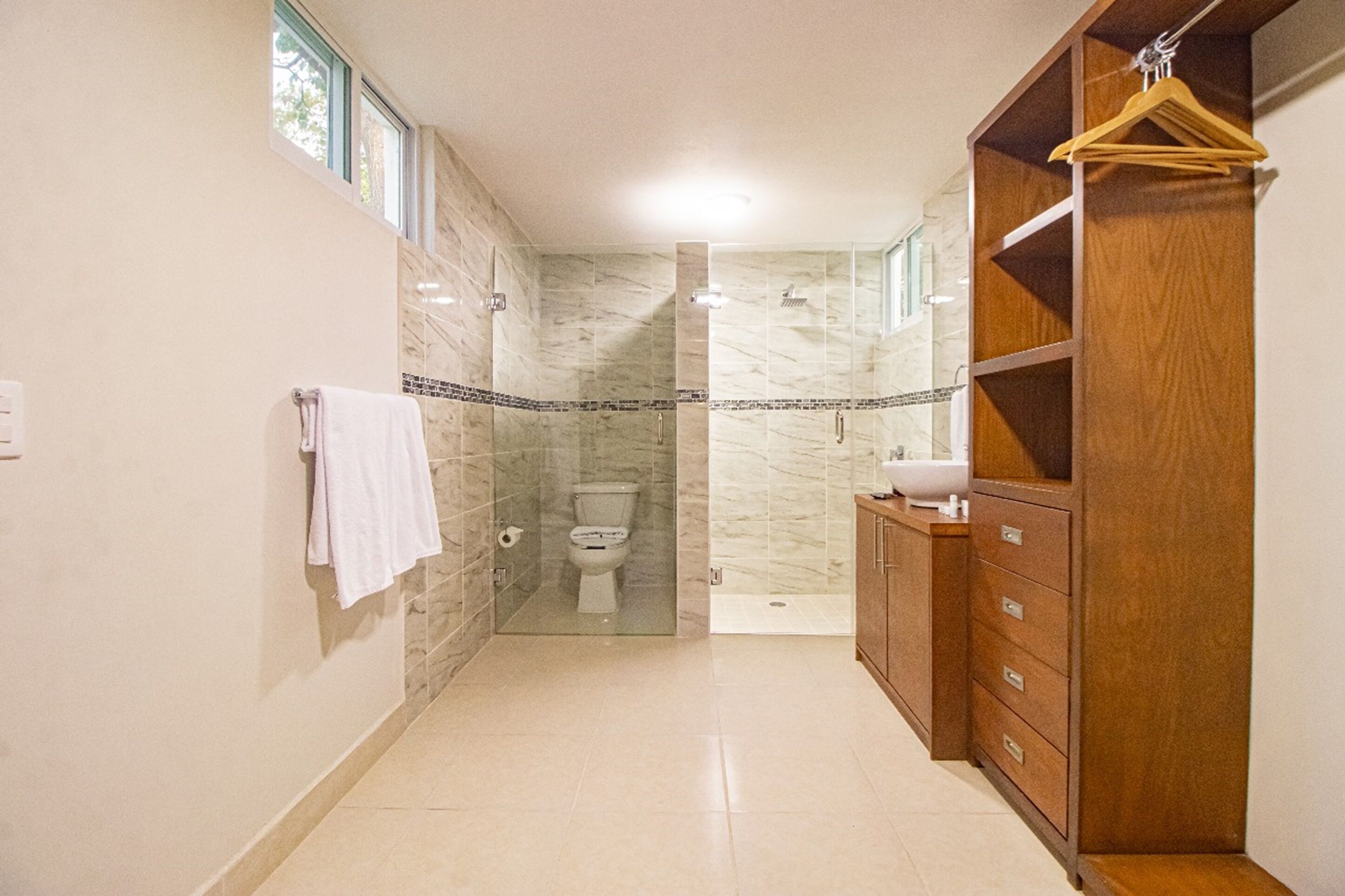 luxury villa | bathroom | towels, soap, shampoo, toilet paper