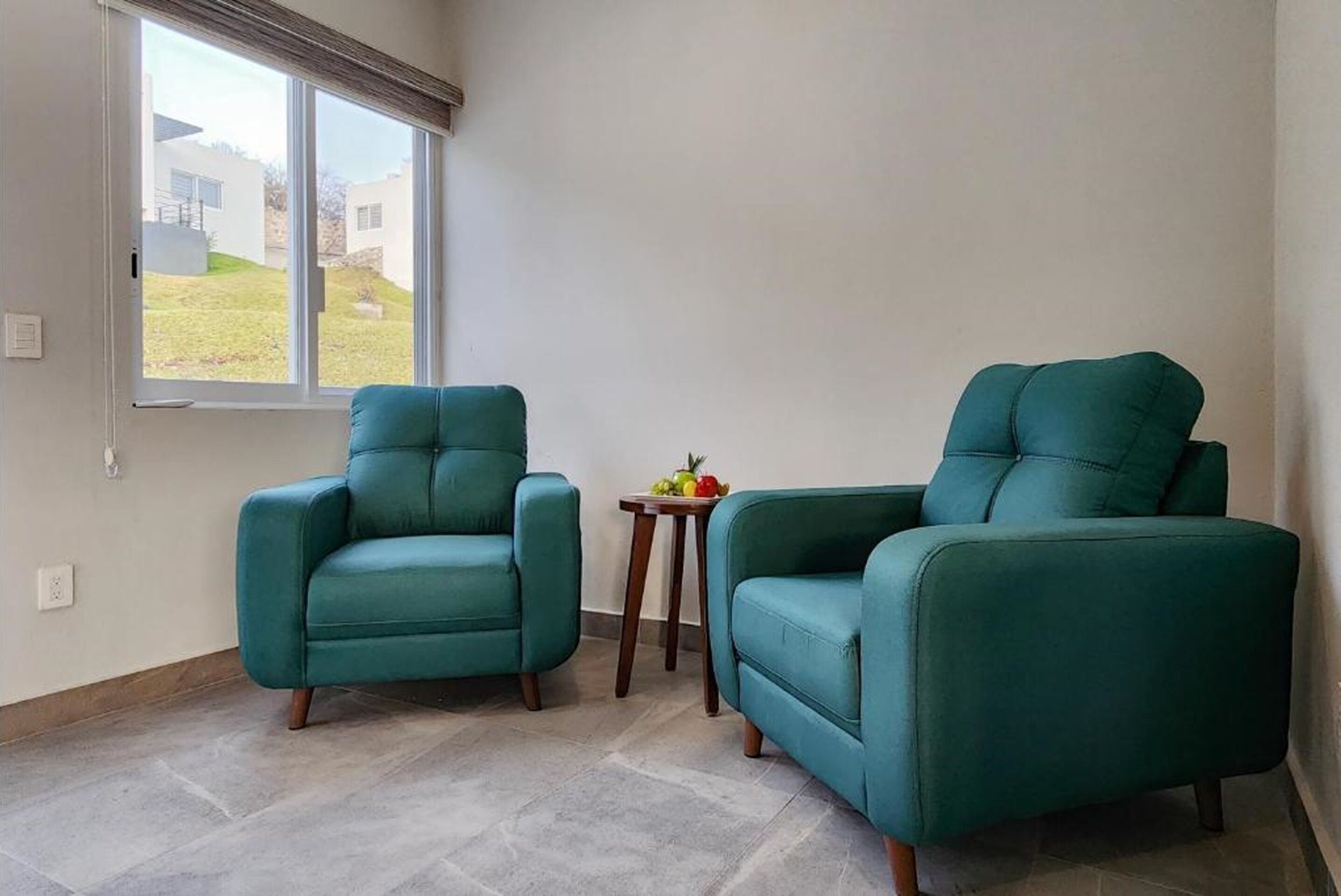 luxury villa | living area | 32-inch flat-screen tv with satellite channels