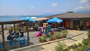 Private beach nearby, black sand, sun loungers, beach umbrellas