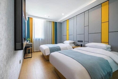 Mingyang Hotel (Taiyuan South Station Shanxi University Store)