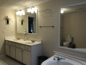 Combined shower/tub, hair dryer, towels, soap