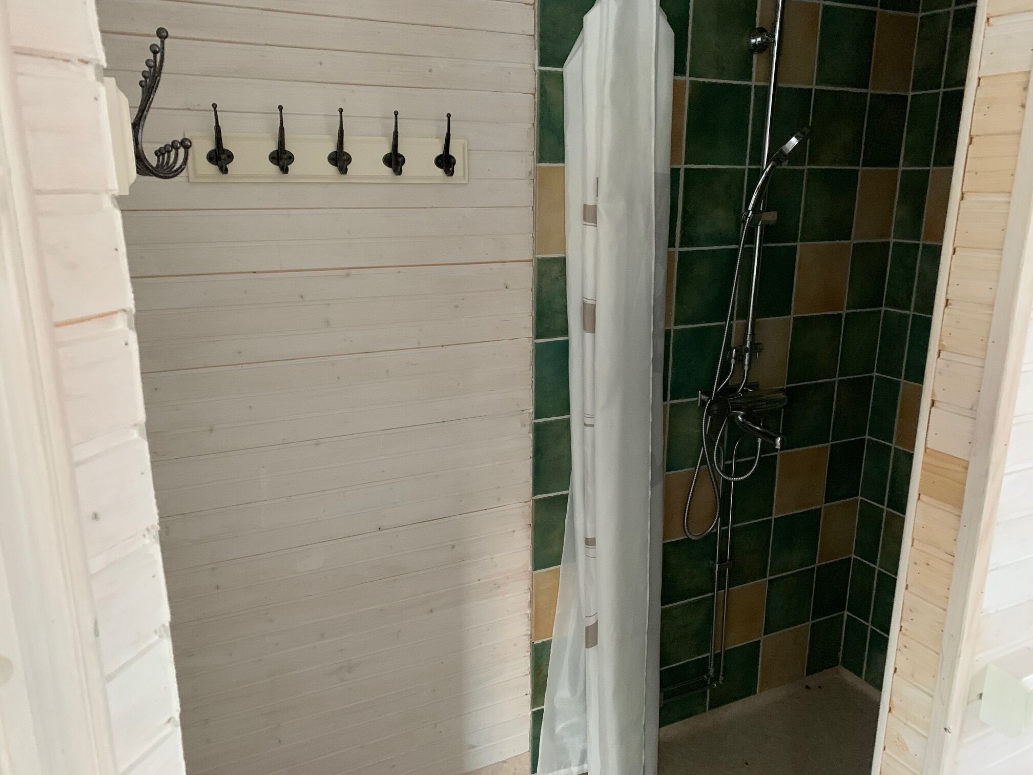 Shower, hair dryer, towels, toilet paper