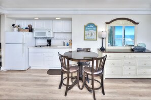 Fridge, microwave, stovetop, coffee/tea maker