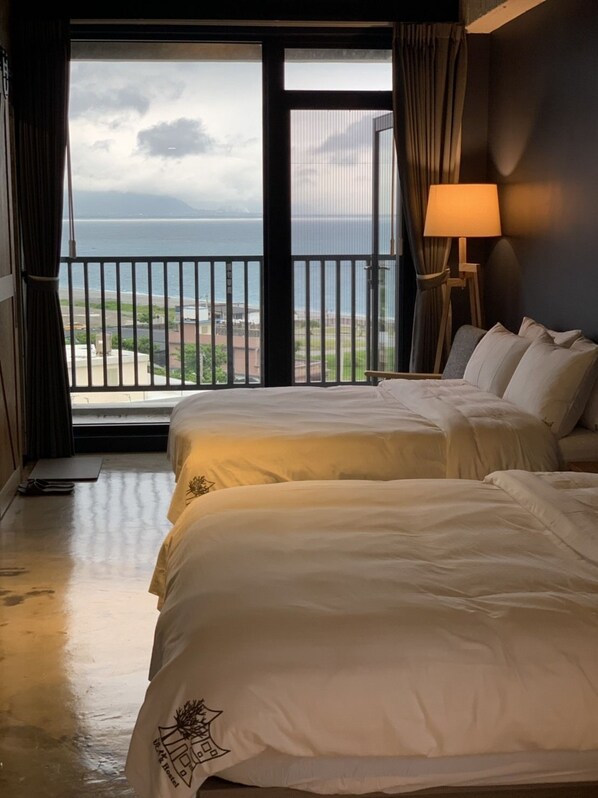 Deluxe Quadruple Room, Non Smoking, Ocean View | Premium bedding, down comforters, blackout drapes, soundproofing - Comesit (Xincheng)