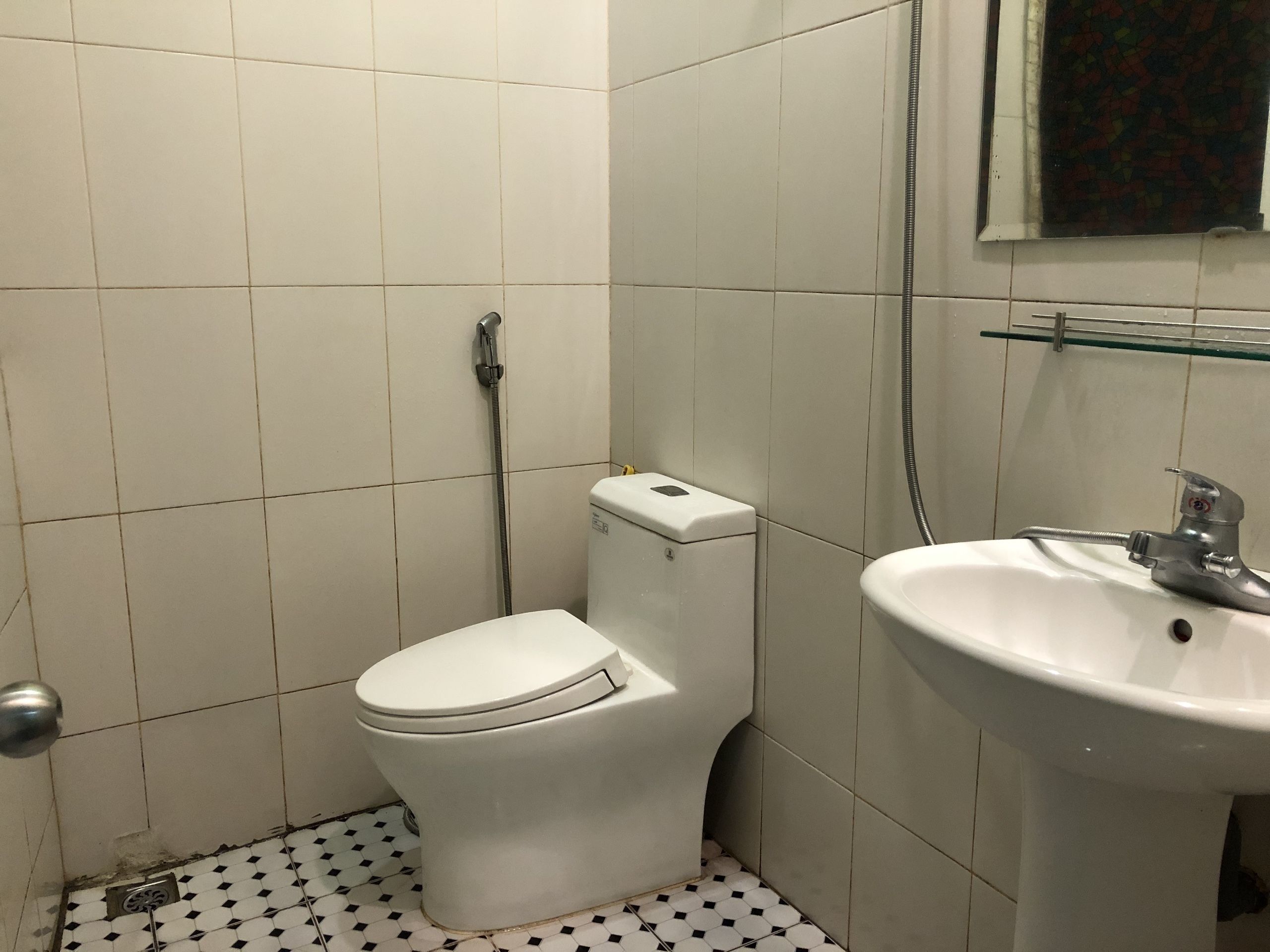 Shower, free toiletries, hair dryer, slippers