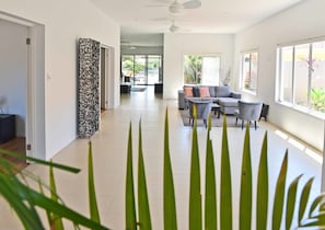 Exclusive House, Multiple Beds, Accessible, Canal View | Living room | Flat-screen TV - The Promenade on Capri (Surfers Paradise)