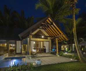 A modern house with a pool, wooden deck, and palm trees. - Ayana Sea (Wadduwa)