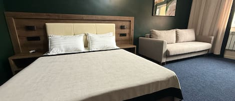 Premium bedding, desk, blackout curtains, soundproofing