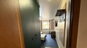 Premium bedding, desk, blackout curtains, soundproofing