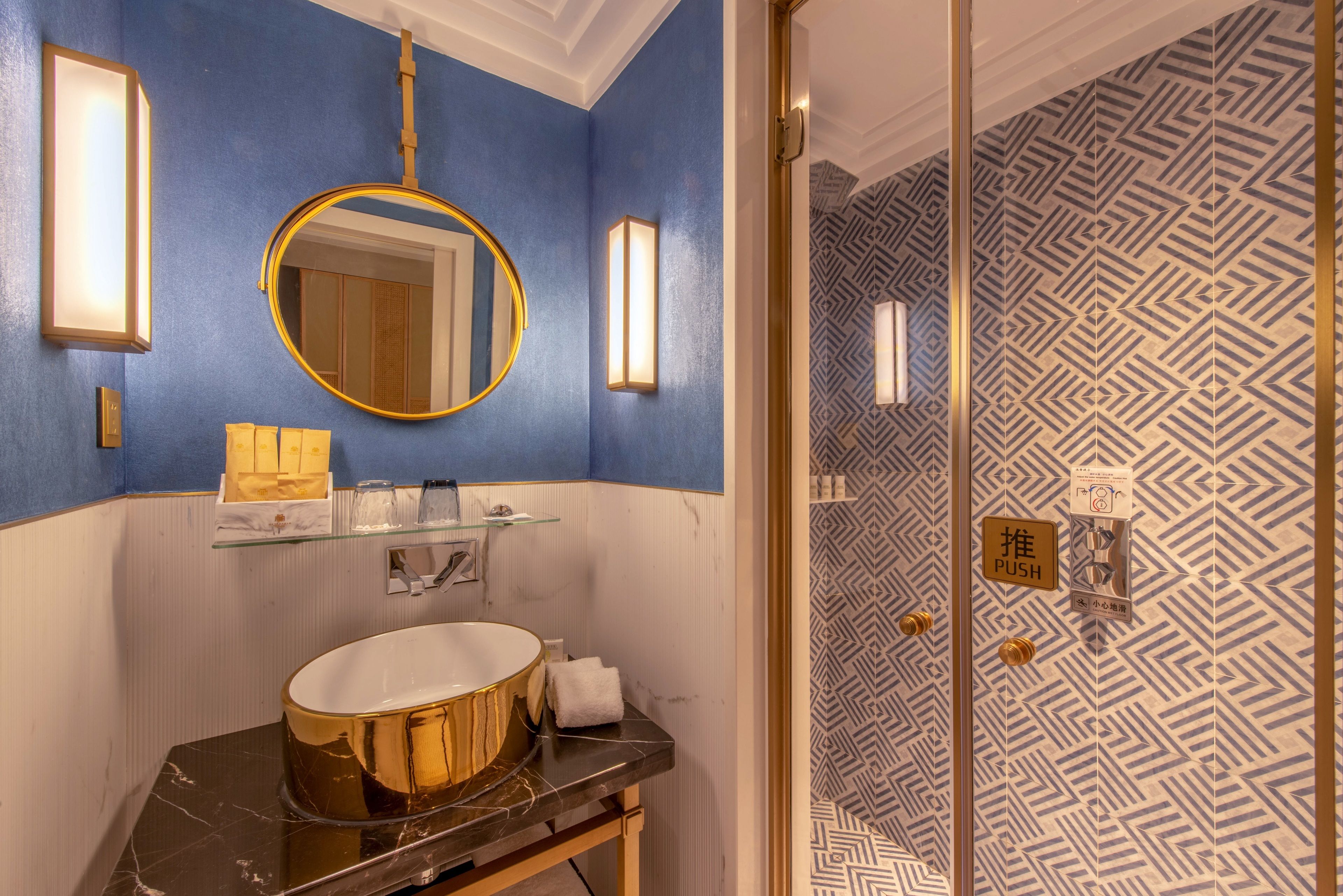 superior twin room | bathroom | shower, hair dryer, slippers, towels