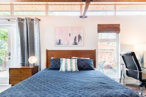 1 bedroom, desk, iron/ironing board, travel crib