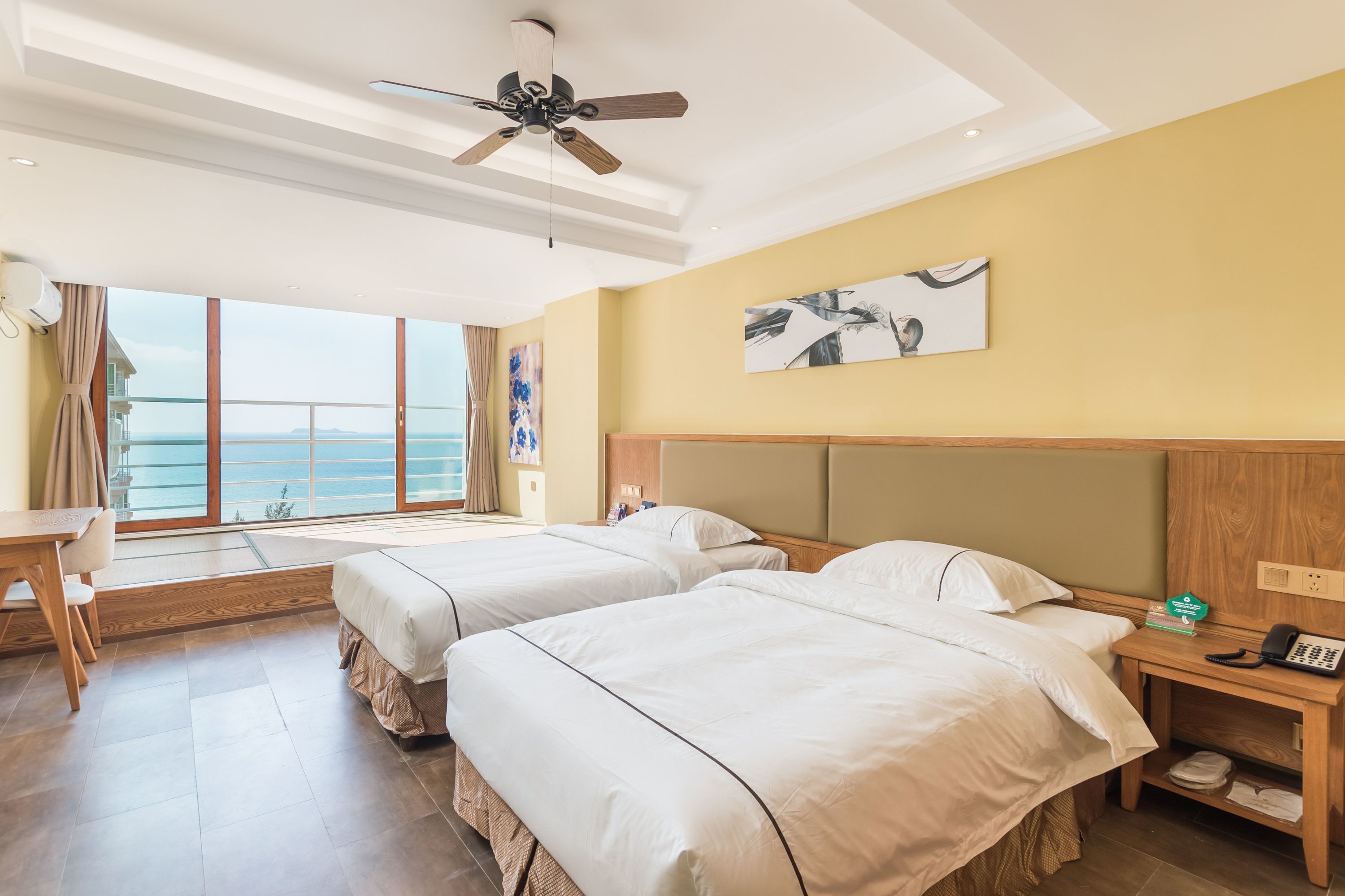 signature suite, sea view | in-room safe, desk, blackout curtains, iron/ironing board
