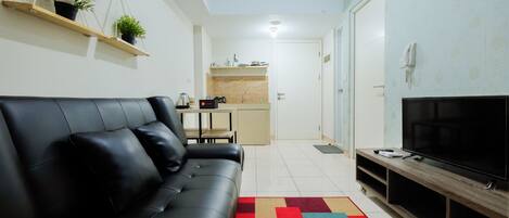 Habitación | Área de sala de estar | Televisión