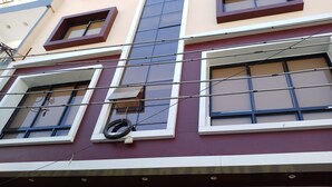 A building with the sign "HOTEL & PRATHAM MILAN" indicating a hotel establishment. - Hotel Shree Pratham Milan (Nathdwara)