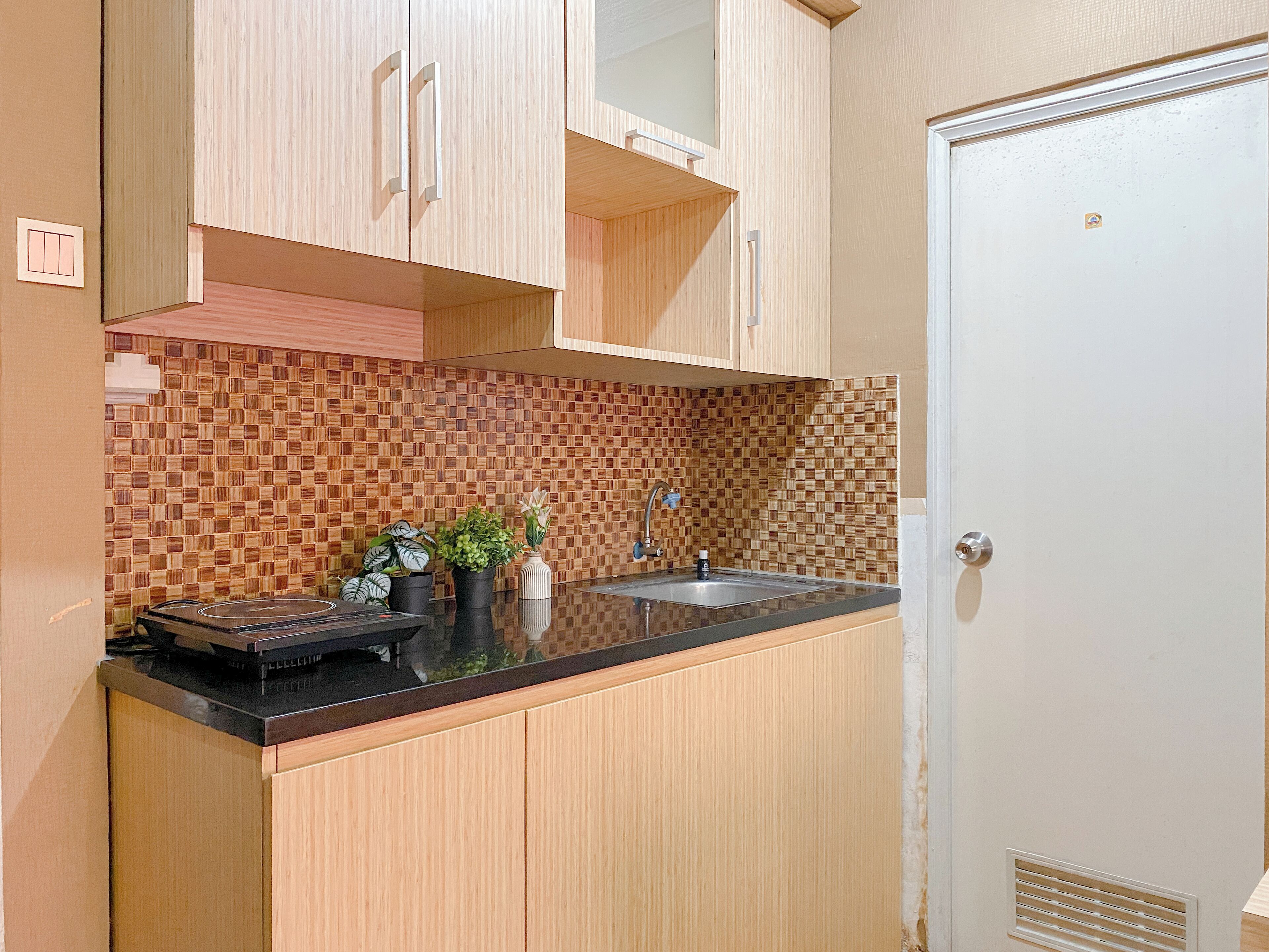 Habitación | Cocina privada | Frigorífico, placa de cocina, hervidor eléctrico y arrocera