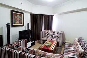 Chambre | Salle de séjour | Téléviseur
