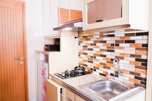 Private kitchenette - Modern Furnished Studio Room Cinere Bellevue Suites Apartment (Depok)