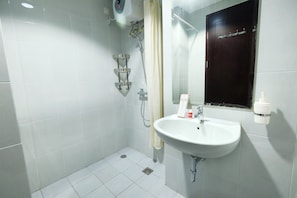 Habitación | Baño | Ducha y toallas