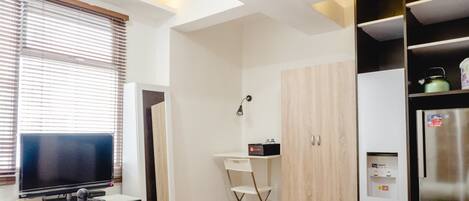 Habitación | Área de sala de estar | Televisión