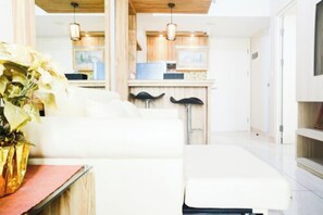 Room | Living area | TV - Comfortable 2BR Springlake Summarecon Apartment (Bekasi)