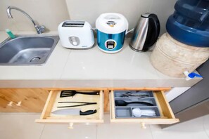 Room | Private kitchen - Homey Studio Room The Nest Apartment (Tangerang)