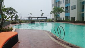 Outdoor pool - Homey Studio Room The Nest Apartment (Tangerang)